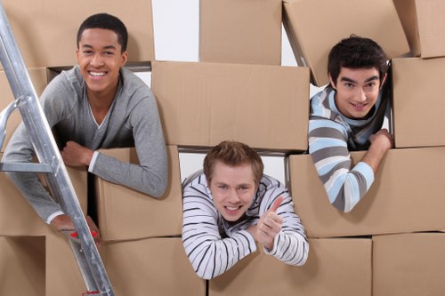 Local Tooting moving team unpacking boxes in a new property