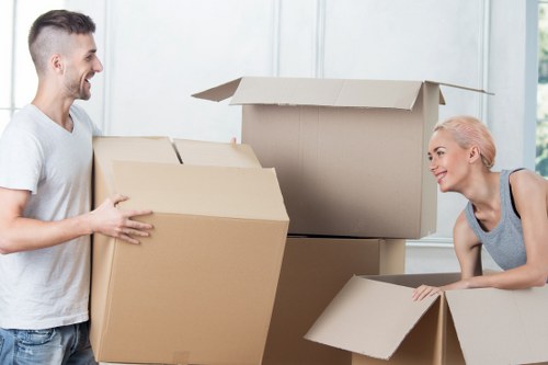 Professional office relocation team handling equipment for a Tooting business move