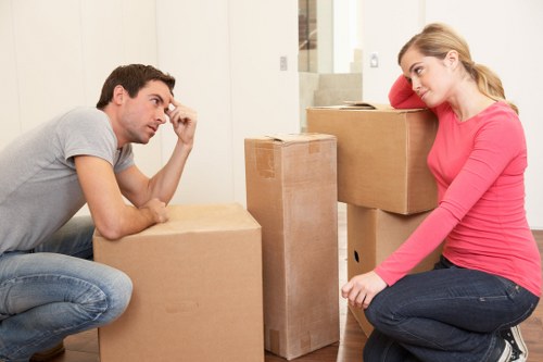 Packed boxes and furniture prepared for storage in Tooting
