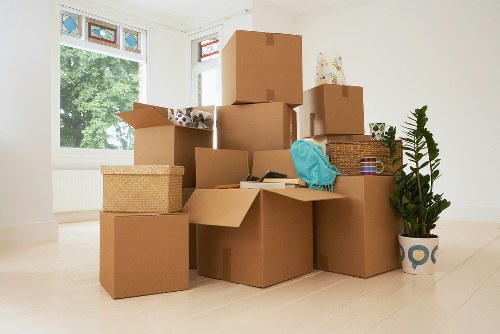 Professional removals team handling a flat move in a South London apartment block