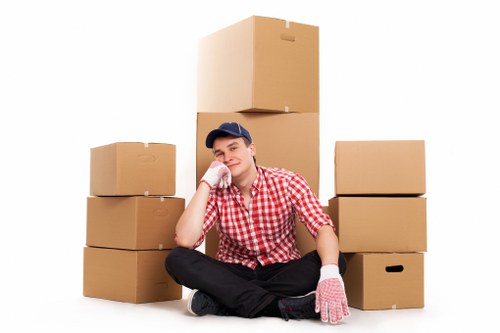 Careful wrapping and labelling of household items during packing service