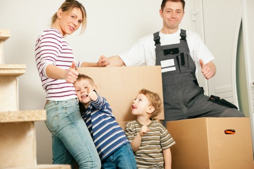 Professional movers loading furniture for a Tooting relocation